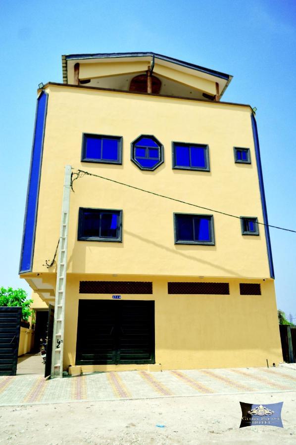 Glory Palace Hotel Cotonou Bagian luar foto